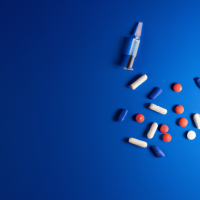 Design a cover of blue backgroud, with light and dark shades, and add medicine with different colors and capsules and ampoules. adjust all this professionally.